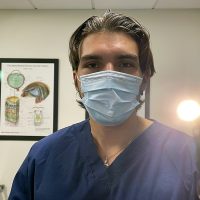 Vladislav Kirilov shining light at camera