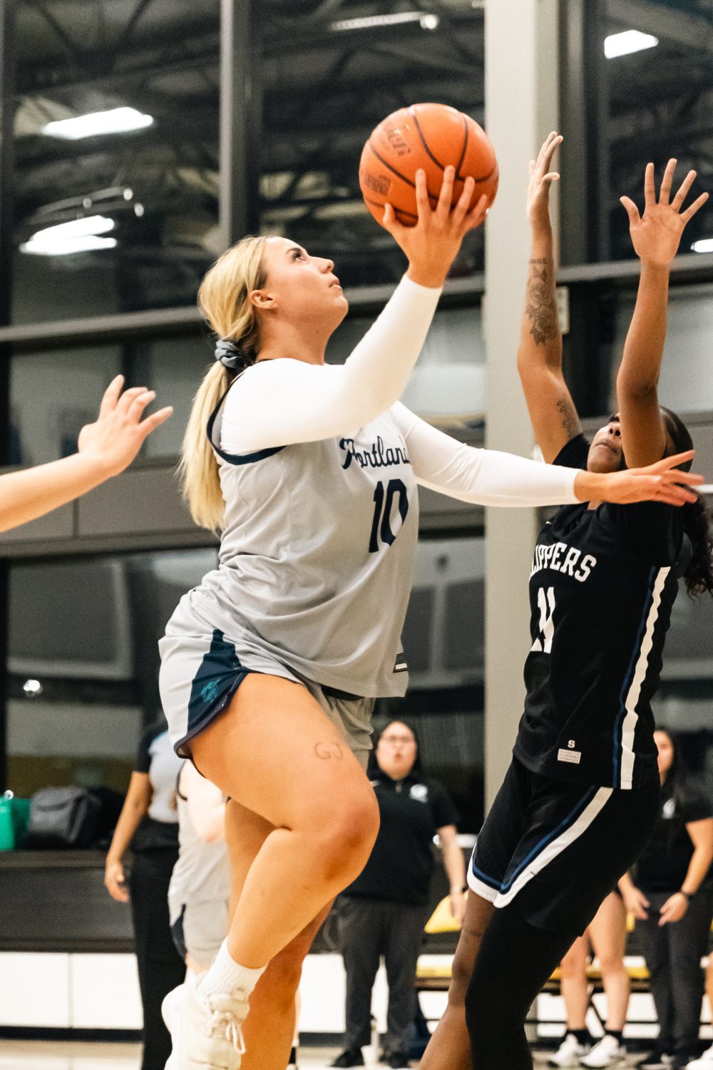 #10 forward for PCC Panthers goes for the hoop.