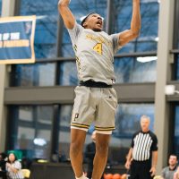 PCC Basketball Guard jumps for the hoop.