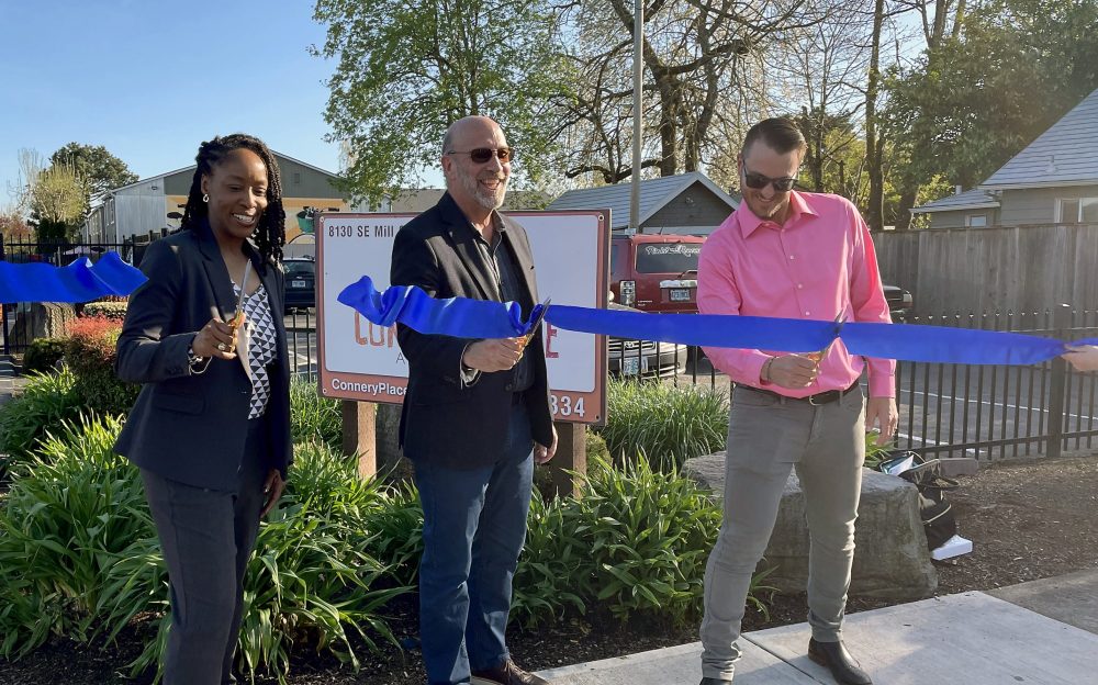 Connery Place ribbon cutting with Dr. Adrien Bennings.