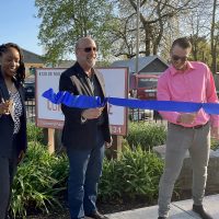 Connery Place ribbon cutting with Dr. Adrien Bennings.