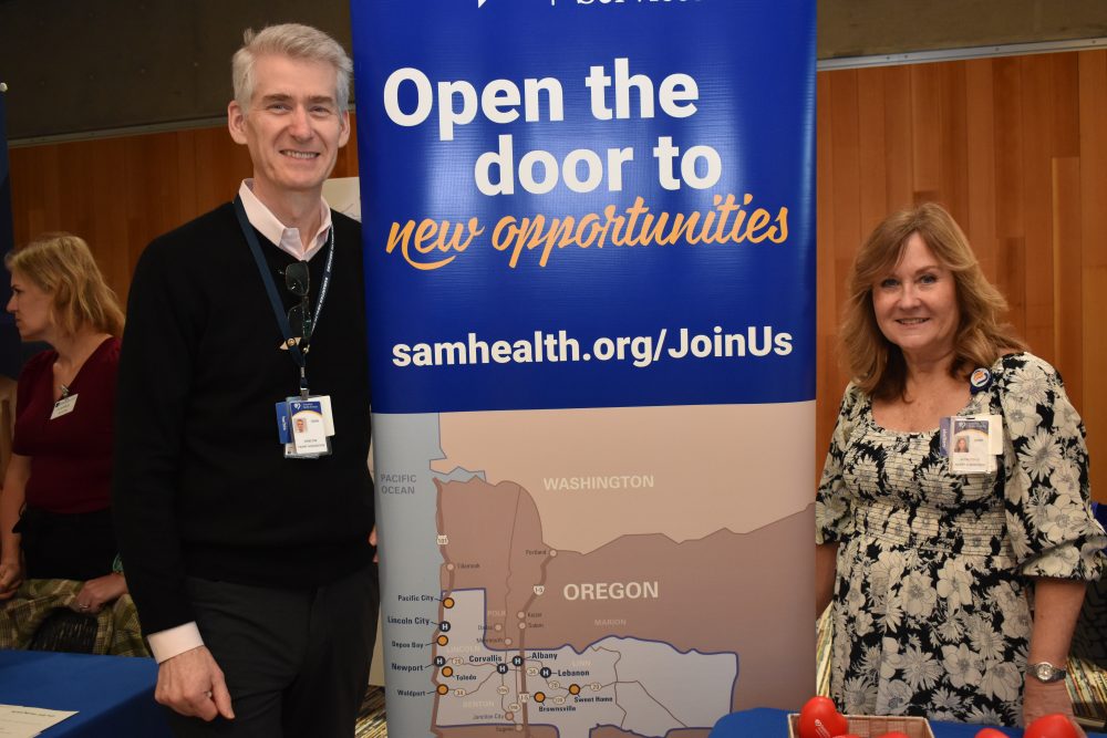 Two recruiters from Samaritan Health at their exhibit.