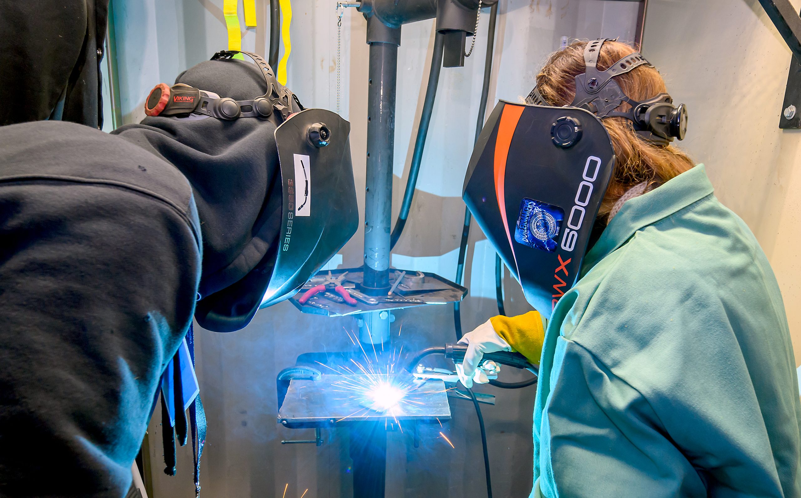 welders in action.