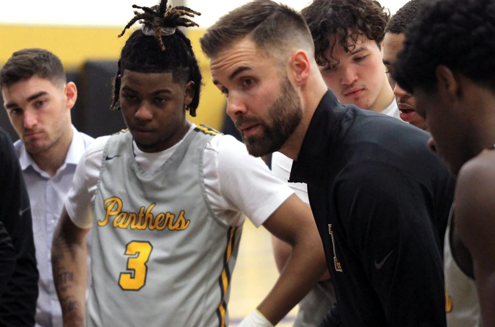 Cameron Mitchell coaching during a timeout.