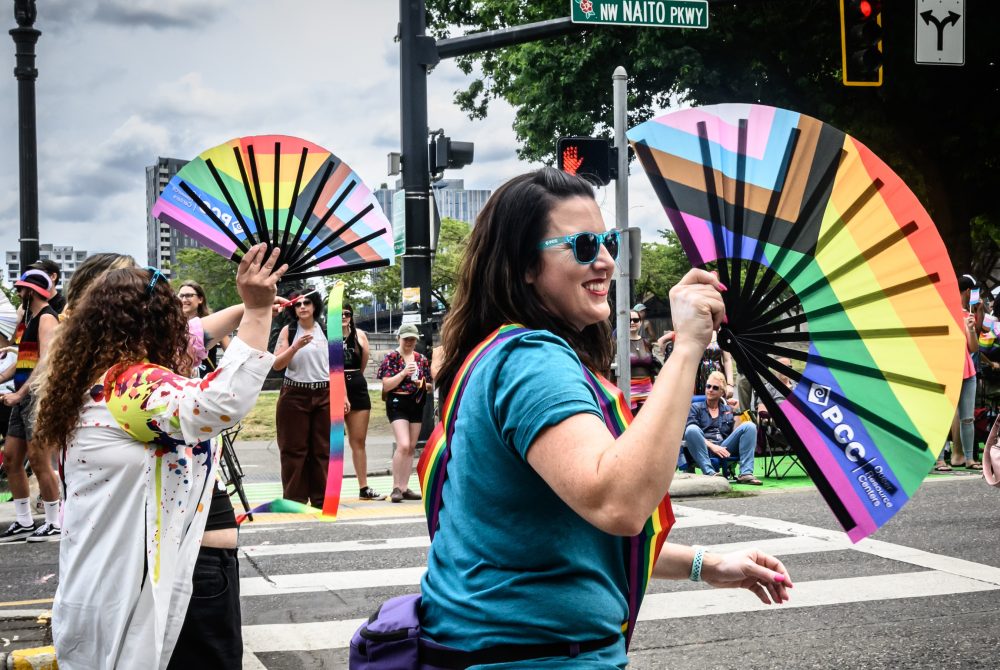 Pride marchers with fans