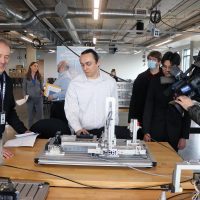 KGW TV camera films students learning.