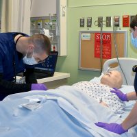 Nursing student training in the Sylvania Campus lab.