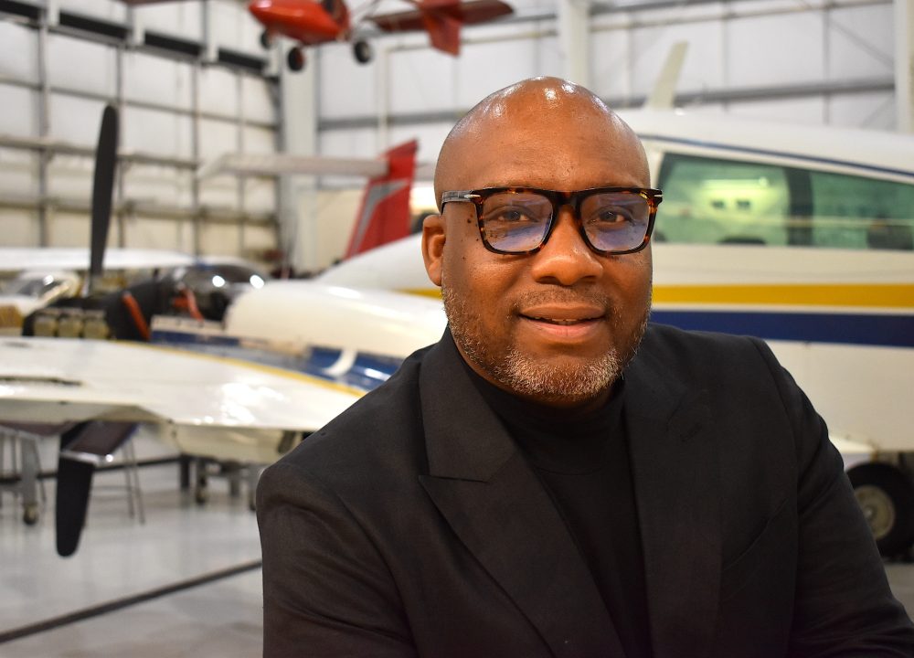 Josh Coleman at the aviation hangar at Rock Creek Campus.