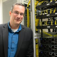 Brandon Gatke in PCC server room.
