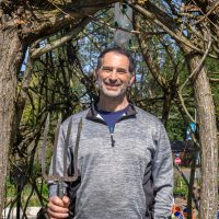 Peter Ritson with pitch fork