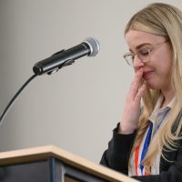 An emotional Gina Ferguson speaking at the All-Oregon Academic Team Award Luncheon in April.