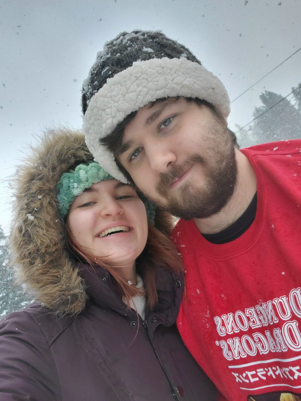 Black line drawing tattoo of a rat scientist on a woman's arm.