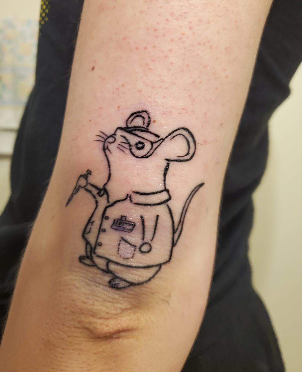 Ink drawing of a comical doctor rat.