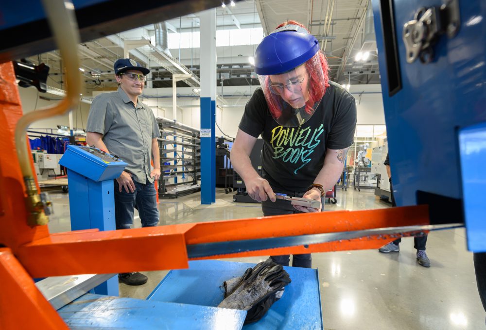 Adam Railsback uses CNC with help from David Holdridge