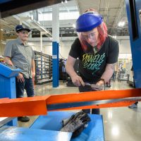 Adam Railsback uses CNC with help from David Holdridge