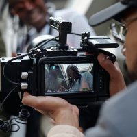 Filming a Person Talking Through Professional Camera