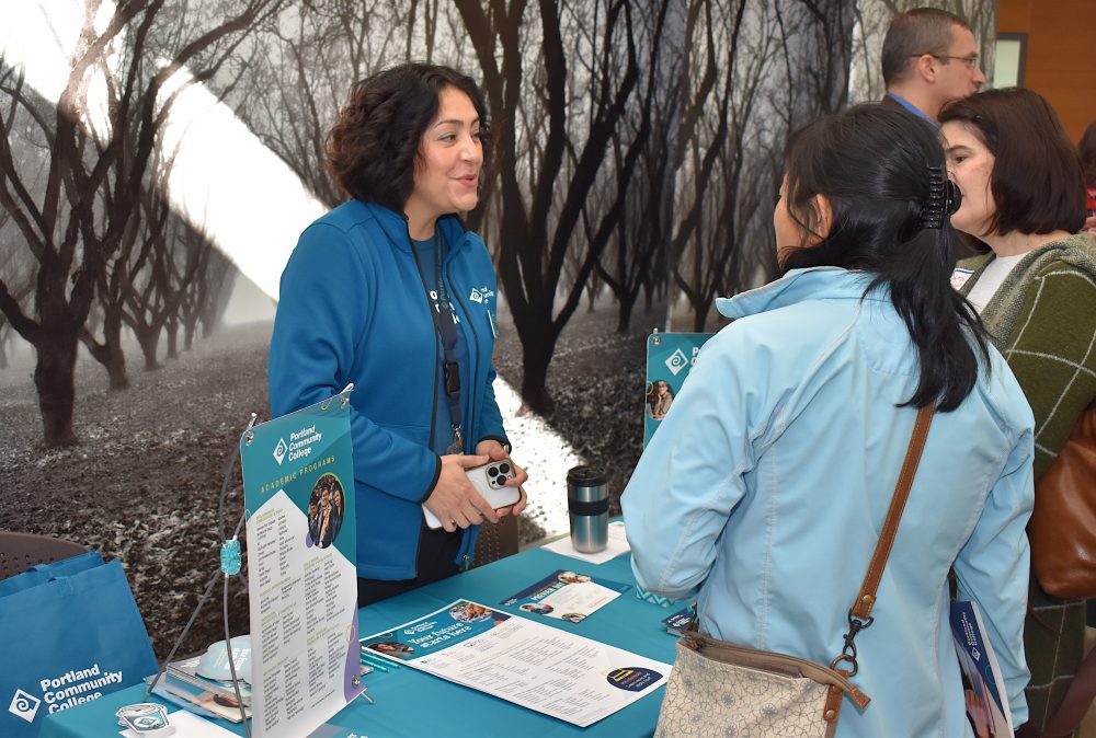 Teresa Salinas, admissions and recruitment coordinator, discusses what PCC has to offer with a member of the public.