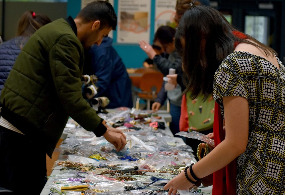 Hundreds of employees and students shop at the sale to find that hidden gem.