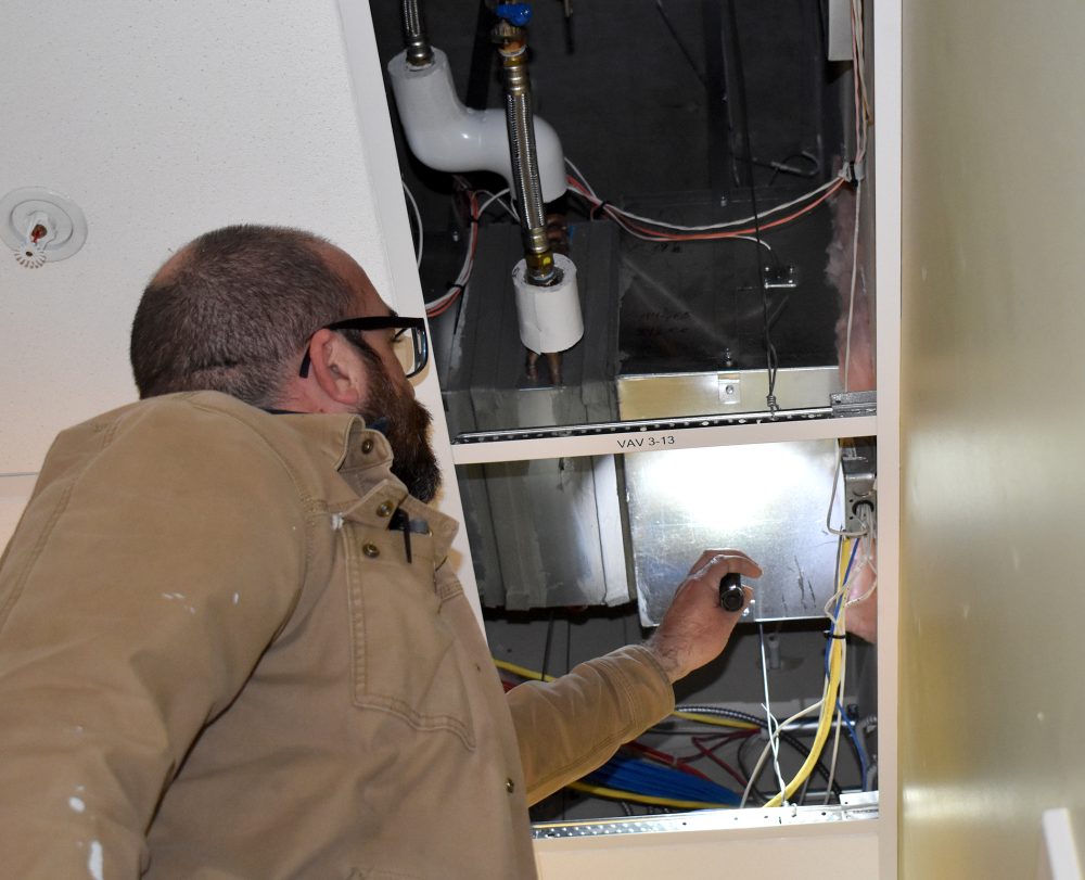 Jimmy Hood, a facilities operations maintenance specialist and member of the Strategic Energy Management (SEM) team, is charged with making sure the energy-saving systems are working effectively.