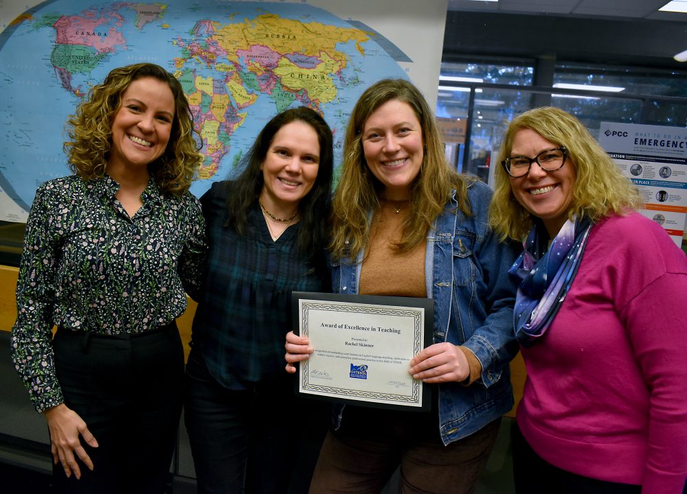 ESOL faculty with Rachel and her award.
