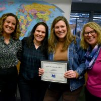 ESOL faculty with Rachel and her award.