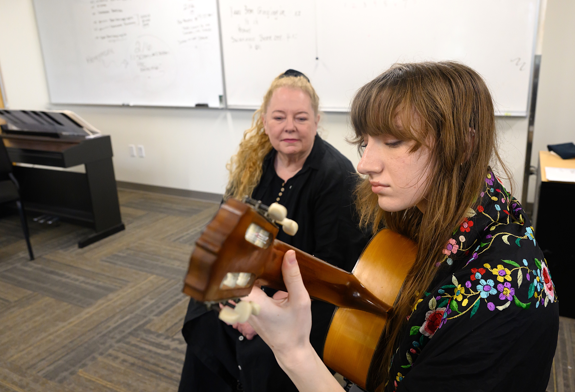 Grace Stramel being tutored by Julia Banzi.