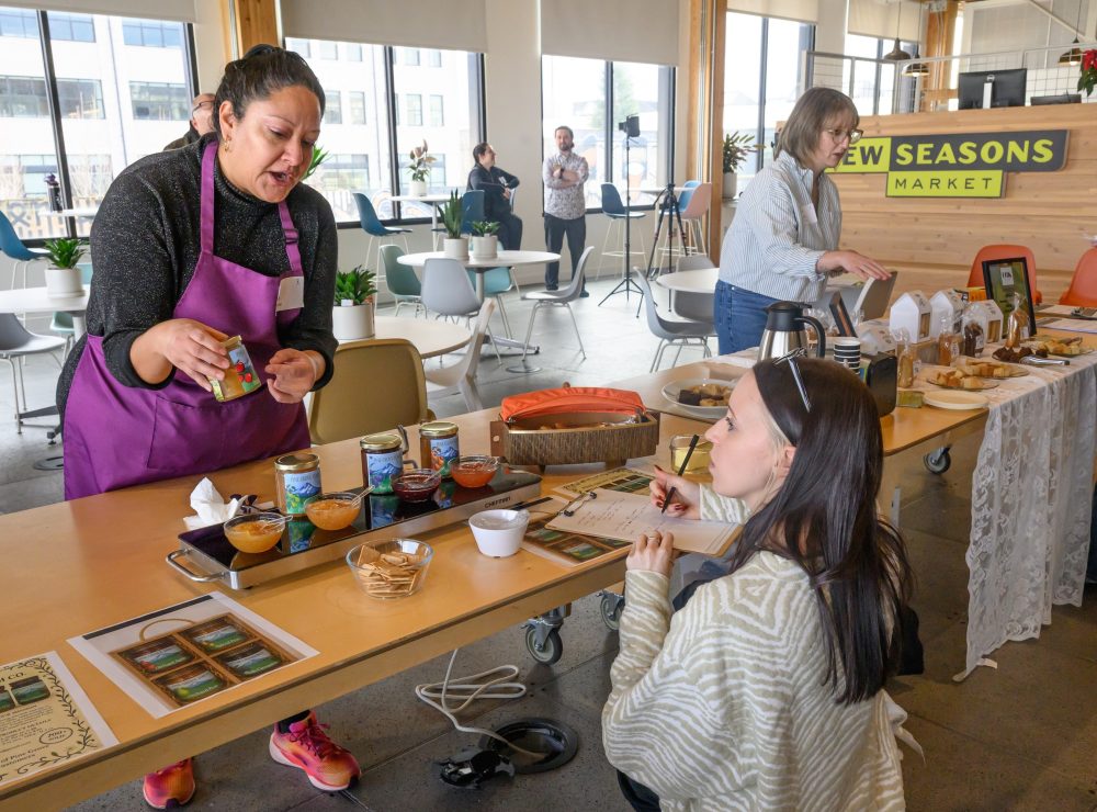 Moriah Krussow presents to New Seasons.