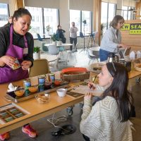 Moriah Krussow presents to New Seasons.