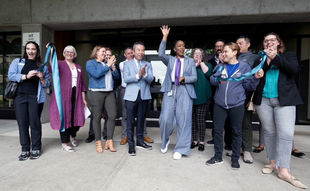 Dr. Adrien Bennings celebrates the official opening of the HT Building's westside with State Rep. Daniel Nguyen and guests and PCC staff.