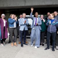 Dr. Adrien Bennings celebrates the official opening of the HT Building's westside with State Rep. Daniel Nguyen and guests and PCC staff.
