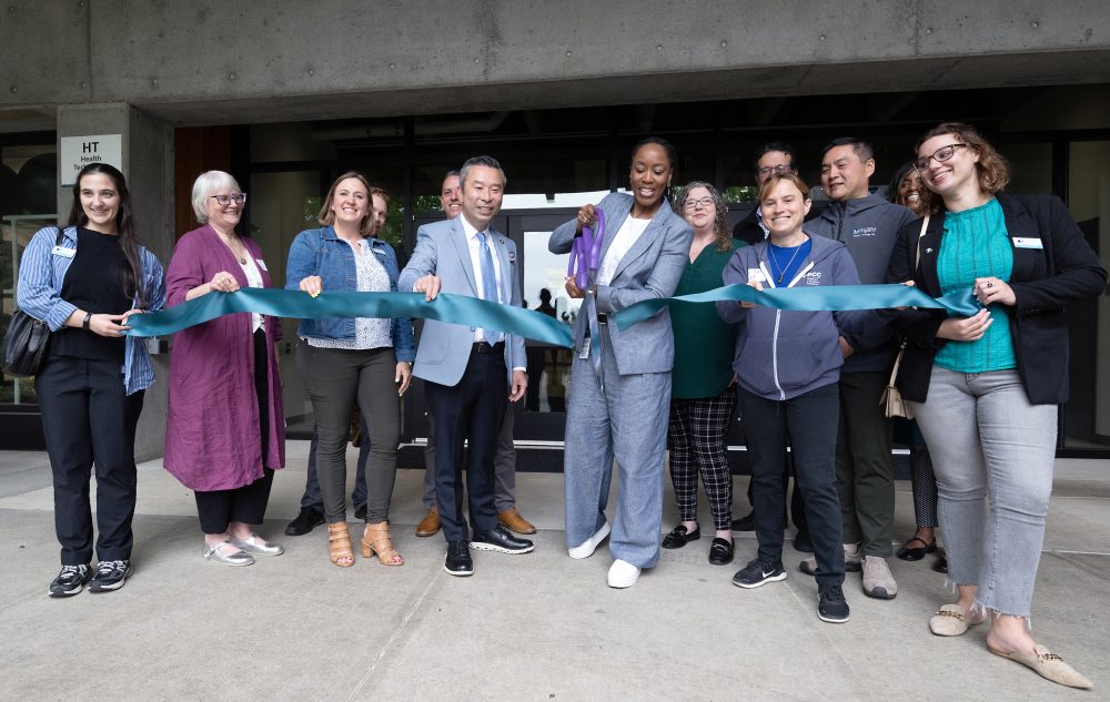 Ribbon cutting with Adrien Bennings and Rep Daniel Nguyen and guests