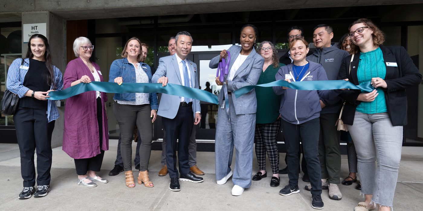 Ribbon cutting with Adrien Bennings and Rep Daniel Nguyen and guests