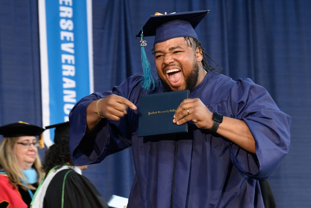 A grad celebrates