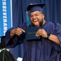 A grad celebrates