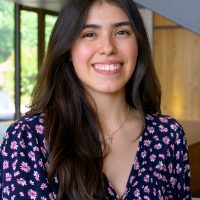 Lizbeth Ramos at Building 5 and smiling
