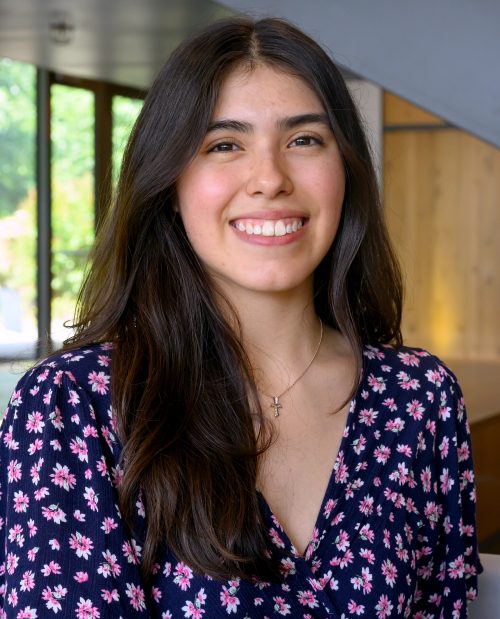 Lizbeth Ramos at Building 5 and smiling