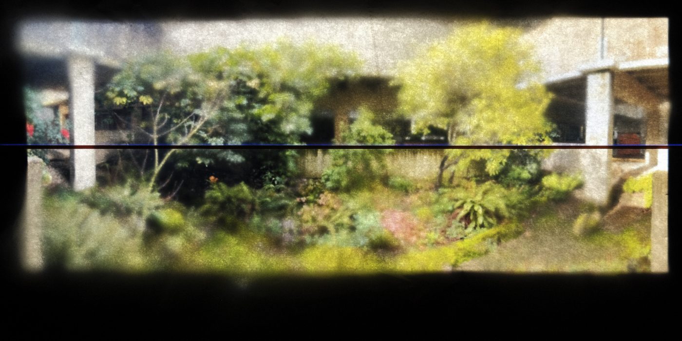 Posterized color Image of verdant green PCC Campus with brutalist concrete building courtyard.