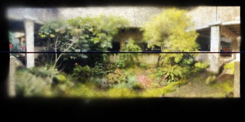 Posterized color Image of verdant green PCC Campus with brutalist concrete building courtyard.