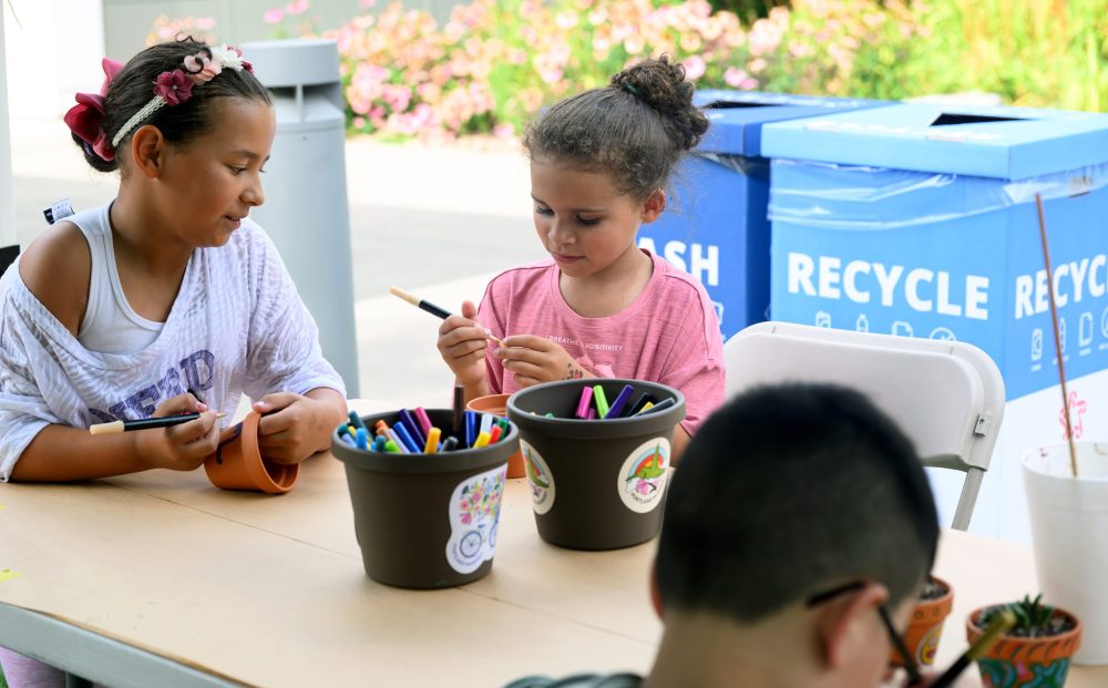 Kids working on arts and crafts.