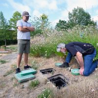 Gordon Kunkle, an instructor with PCC’s Professional Development and Training Program, inspects an irrigation system for his workshop at the Rock Creek Campus.