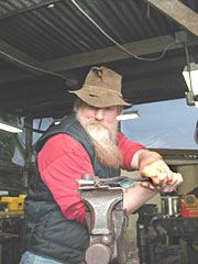 Wolfgang forges steel.