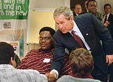 President Bush greets students.