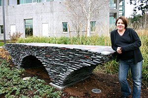Marie Watt with her sculpture Pedestrian.