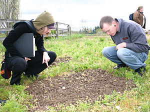 students analyze soil.