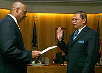 Pulliams swears in Jaime Lim as vice chair.