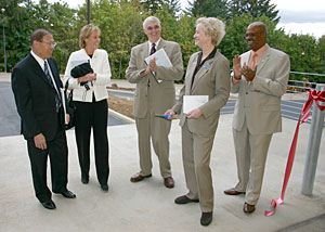 PCC Board members, left to right, Jaime Lim, Denise Frisbee, Jim Harper and Doreen Margolin join District President Preston Pulliams for the building's ribbon cutting ceremony: 
