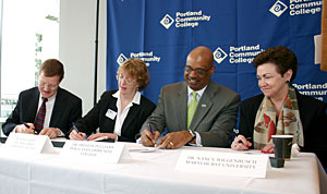 From left to right, signing the agreement were Tillamook Bay Community College President Ralph Orr; Columbia Gorge Community College Dean of Instruction Susan Wolff; Portland Community College District President Preston Pulliams; and Marylhurst University President Nancy Wilgenbusch. 
