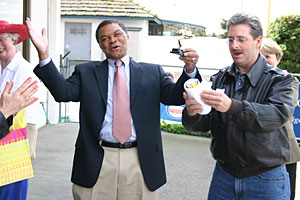 Algie Gatewood (left) wins a trophy from Foundation Director Mike Drake for his fast lap.