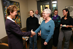 Katherine Persson (left) says 'hello' to staff during her meet-and-greet at the Rock Creek Campus.