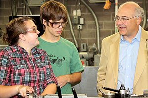 Brad Avakian with student Hannah Parker